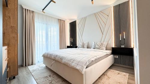 Ένα ή περισσότερα κρεβάτια σε δωμάτιο στο Sky Central