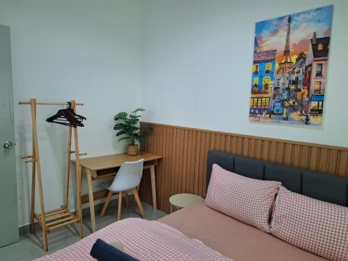 a bedroom with a bed and a table and a desk at Amber Cove - Luxury Design By Luxpro Management - 6~7 pax in Melaka