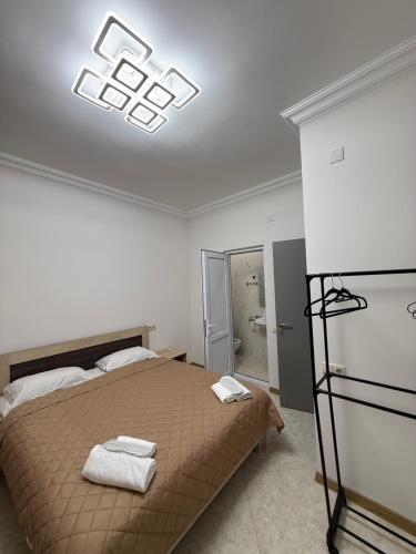 Giường trong phòng chung tại Guest House MD