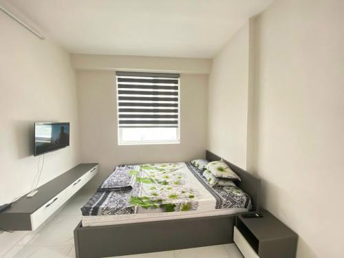 Postel nebo postele na pokoji v ubytování Apartment 3BR Hacom Phan Rang