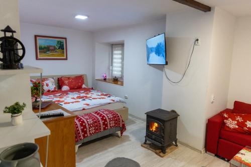 Ένα ή περισσότερα κρεβάτια σε δωμάτιο στο Guest House Lejla