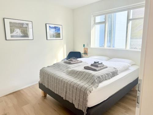 Voodi või voodid majutusasutuse The Ísafjörður Inn by Ourhotels toas