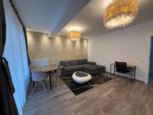 Posezení v ubytování The View Apartment Bușteni