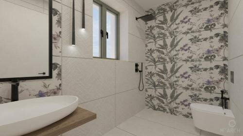 Ένα μπάνιο στο Carob Luxury Villas