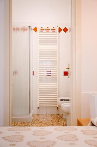 a bathroom with a shower and a toilet at Hotel Roma in Cittadella
