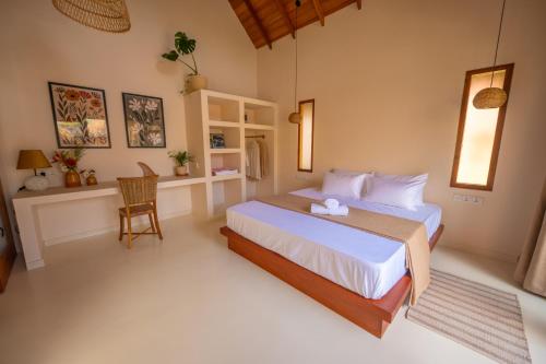 Ένα ή περισσότερα κρεβάτια σε δωμάτιο στο De Duck