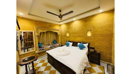 a bedroom with a large bed in a room at Hostel sakura Jaisalmer in Jaisalmer