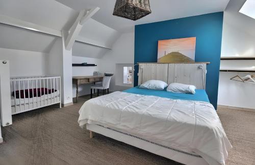 Postel nebo postele na pokoji v ubytování Le Clos Fleuri