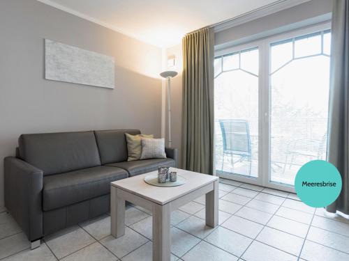 Khu vực ghế ngồi tại Ostsee-Traumferienwohnungen Villa Anika