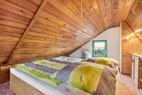 Ένα ή περισσότερα κρεβάτια σε δωμάτιο στο Kleines Ferienhaus Kirschallee