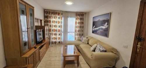 Et tv og/eller underholdning på Arinaga Beach & Pool Apartment