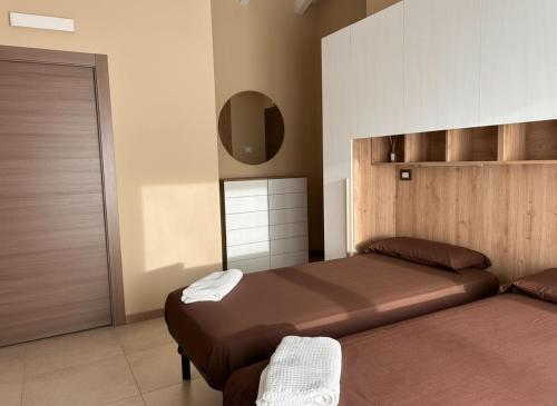 Ένα ή περισσότερα κρεβάτια σε δωμάτιο στο RiVaLoVE