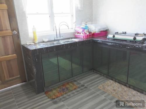 Η κουζίνα ή μικρή κουζίνα στο Ummie Homestay