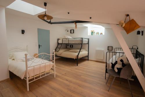 Postel nebo postele na pokoji v ubytování VAL Jaunay