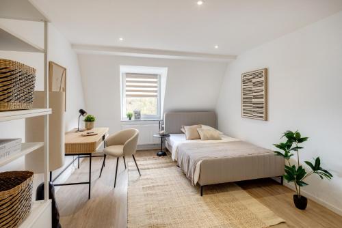 Postel nebo postele na pokoji v ubytování Business Apartment nähe Hauptbahnhof