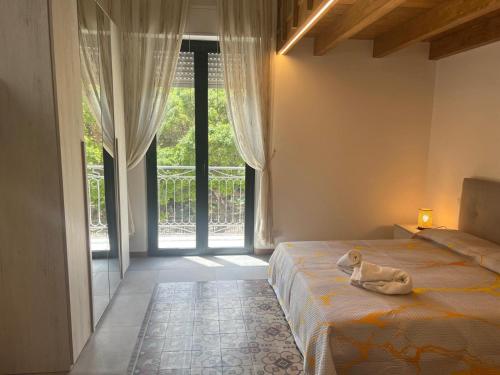 Ένα ή περισσότερα κρεβάτια σε δωμάτιο στο casa serena