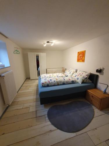 Ένα ή περισσότερα κρεβάτια σε δωμάτιο στο Ferienwohnung Palm