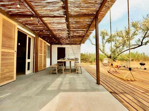 Balkón nebo terasa v ubytování La Cabane du Pêcheur - Mazet de l'Or, Clim & Etang