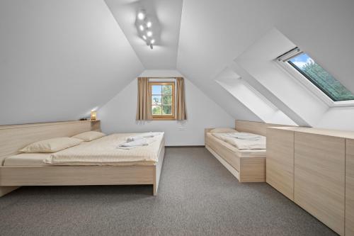 Postel nebo postele na pokoji v ubytování Chata Pinea