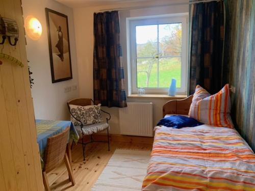 Ένα ή περισσότερα κρεβάτια σε δωμάτιο στο Outside by Katharina