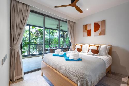 Ένα ή περισσότερα κρεβάτια σε δωμάτιο στο Beachside Residences 3 BR apartment by NLA