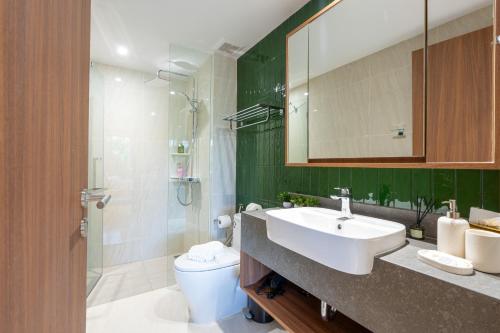 Ένα μπάνιο στο Beachside Residences 3 BR apartment by NLA