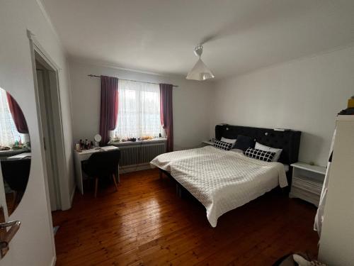 Ένα ή περισσότερα κρεβάτια σε δωμάτιο στο Lily