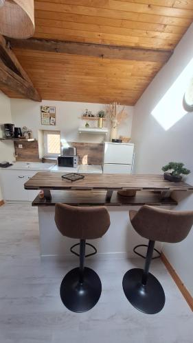 Köök või kööginurk majutusasutuses La tête dans les étoiles