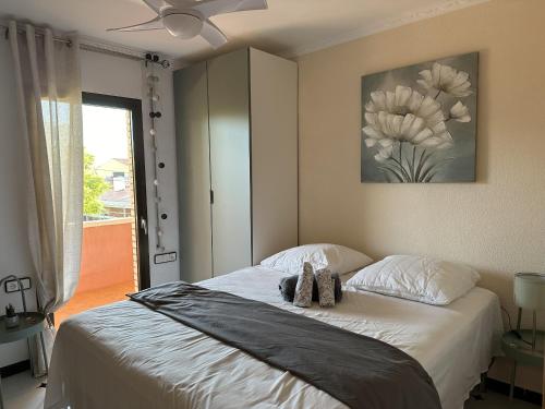 En eller flere senge i et værelse på Casa Viena Vilafortuny