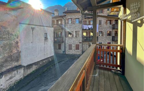 a balcony with a view of a building at Nice Home In Longarone With Wifi in Faè