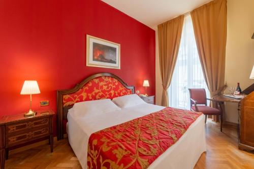 Postel nebo postele na pokoji v ubytování Hotel Isabella