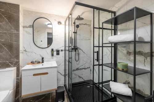 Ένα μπάνιο στο VIP Apartamenty BAST 143 TOP LOCATION - LUX z WANNĄ OFF Piotrkowska Stajnia Jednorożca HopaLupa ATLAS ARENA