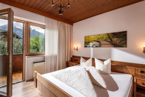 Una cama o camas en una habitación de Landhaus zum Griena