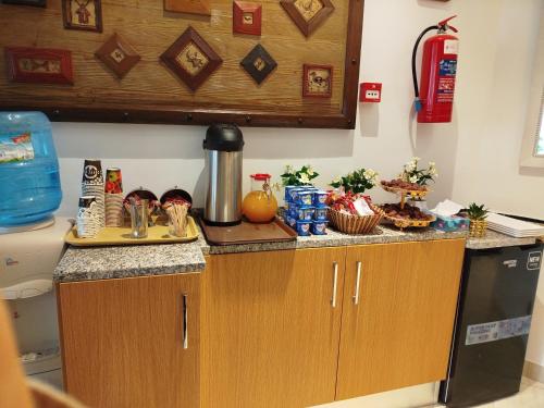 Η κουζίνα ή μικρή κουζίνα στο Hôtel Dar Farhat