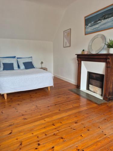 Ένα ή περισσότερα κρεβάτια σε δωμάτιο στο La maison d'Agnes