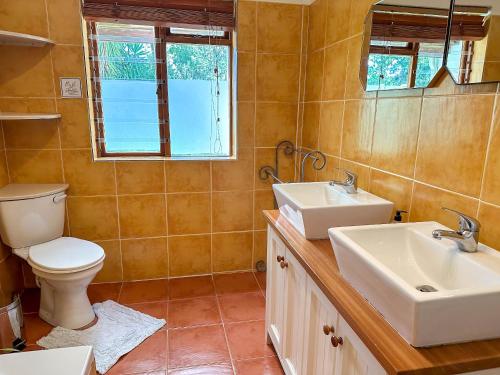 Et badeværelse på Arkelshoek Cottages