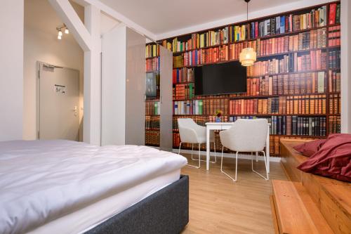 Giường trong phòng chung tại Stadtapartments Greifswald