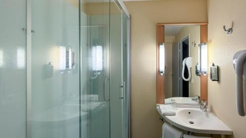 Koupelna v ubytování ibis Rennes Beaulieu