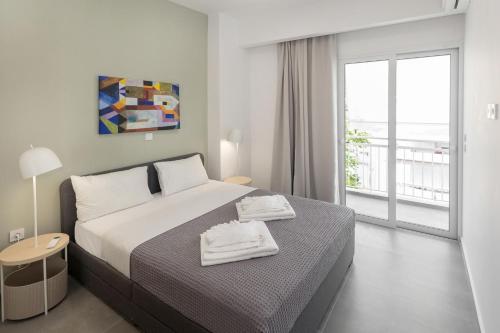 Neos Kosmos Apartment with Access to Acropolis View Rooftop