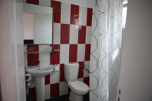 Koupelna v ubytování Hotel Miranda & Miranda