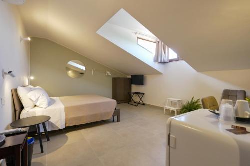 Giường trong phòng chung tại Domus Fabia - Rooms & Apartments