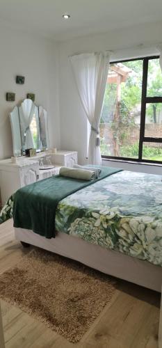 Ένα ή περισσότερα κρεβάτια σε δωμάτιο στο Waybury Cottage - a cozy home from home !