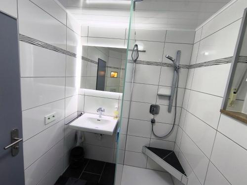 Ένα μπάνιο στο Ferienwohnung Angelika Zimmermann Dettelbach