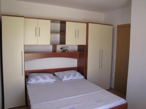 Postel nebo postele na pokoji v ubytování Apartments Mata