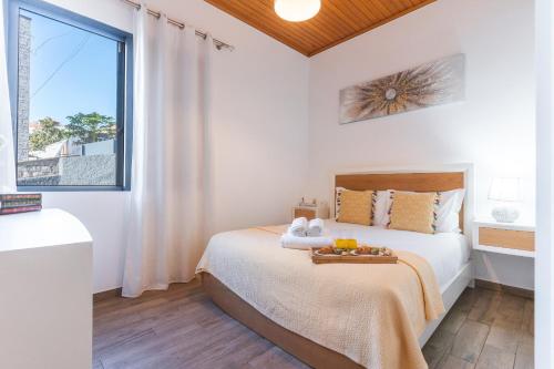 Postel nebo postele na pokoji v ubytování Villa Magnolia by Atlantic Holiday