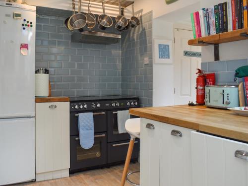 Kuchyň nebo kuchyňský kout v ubytování Beachcroft