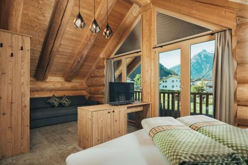 Postel nebo postele na pokoji v ubytování Summit Lodges