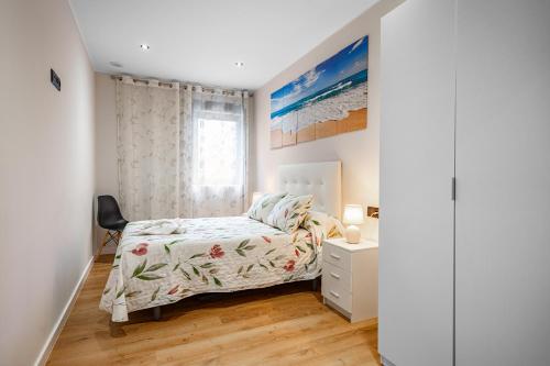 Postel nebo postele na pokoji v ubytování Apartamentos Marta