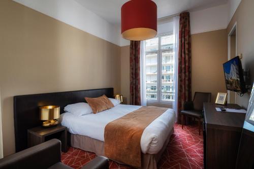 Postel nebo postele na pokoji v ubytování Excelsior