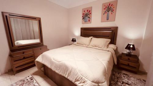 Кровать или кровати в номере Cairo, Madinaty, 2BR, Furnished apartment